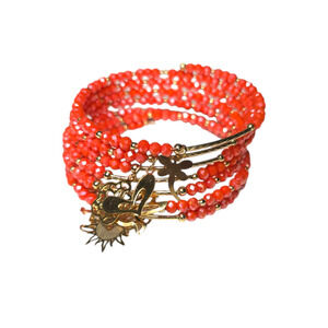 Rubylishious 
Handmade orange bead bracelet with memory Wire 
One size
Has kid,